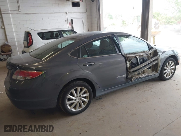 2011 Mazda 6 i Touring with VIN 1YVHZ8CH8B5M30433, listed as a IAAI auction lot 42297382 with 261,637 mi miles and . Bid and sale history available at DreamBid. Image 4.