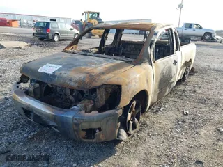 2004 Nissan Titan XE with VIN 1N6AA06A14N511210, listed as a IAAI auction lot 41504876 with 1 mi miles. Bid and sale history available at carsss.com. Image 2.
