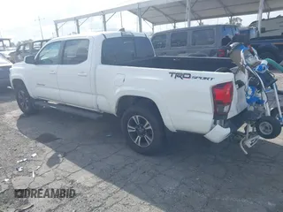 2018 Toyota Tacoma SR5 with VIN 3TMBZ5DN7JM016650, listed as a IAAI auction lot 41903835 with 105,123 mi miles and . Bid and sale history available at DreamBid. Image 3.