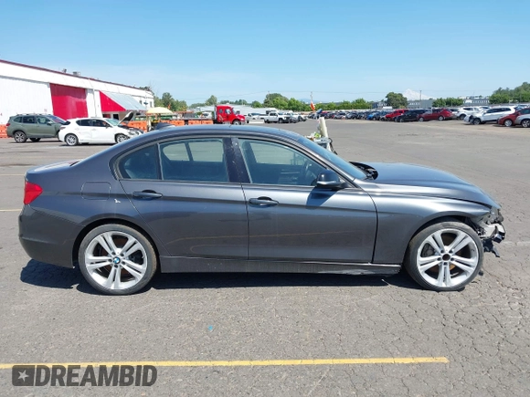 2012 BMW 3 Series 335i with VIN WBA3A9C5XCF077642, listed as a IAAI auction lot 42385611 with 119,251 mi miles and . Bid and sale history available at DreamBid. Image 13.