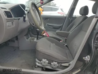 2004 Kia Rio with VIN KNADC125046349408, listed as a Copart auction lot 79868034 with 97,450 mi miles and Clean Title. Bid and sale history available at carsss.com. Image 7.