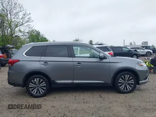 2020 Mitsubishi Outlander SE z VIN JA4AD3A31LJ001086, wystawiony jako IAAI lot #42170611 z przebiegiem 88 367 mil mil oraz . Historia ofert i sprzedaży dostępna na DreamBid. Obrazek 13.