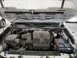 2023 Toyota Tacoma SR z VIN 3TMCZ5AN0PM651386, wystawiony jako Copart lot #51158185 z przebiegiem 23 642 mil mil oraz Szkoda całkowita • Salvage title. Historia ofert i sprzedaży dostępna na DreamBid. Obrazek 12.