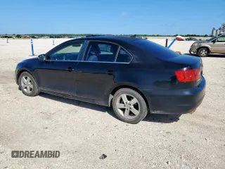 2013 Volkswagen Jetta TDI w/Premium z VIN 3VWLL7AJ7DM232096, wystawiony jako Copart lot #57265725 z przebiegiem 120 361 mil mil oraz Szkoda całkowita • Salvage title. Historia ofert i sprzedaży dostępna na DreamBid. Obrazek 2.