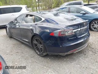 2014 Tesla Model S 60 with VIN 5YJSA1H15EFP43884, listed as a IAAI auction lot 41993180 with 78,305 mi miles and . Bid and sale history available at DreamBid. Image 3.