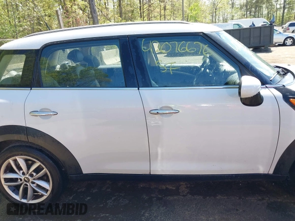 2013 MINI Countryman with VIN WMWZB3C56DWR36117, listed as a IAAI auction lot 42076676 with 168,750 mi miles and . Bid and sale history available at DreamBid. Image 13.