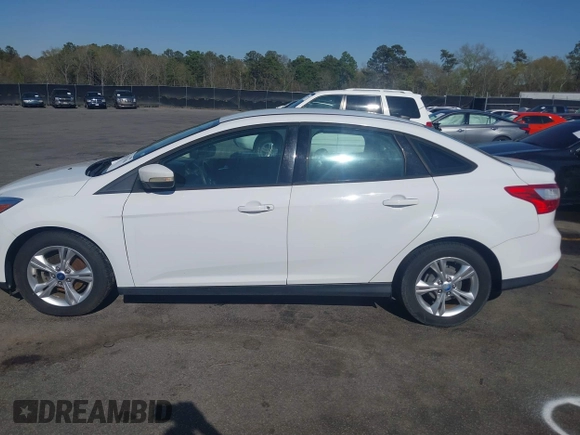 2013 Ford Focus SE with VIN 1FADP3F25DL223541, listed as a IAAI auction lot 41877904 with 192,484 mi miles and . Bid and sale history available at DreamBid. Image 14.