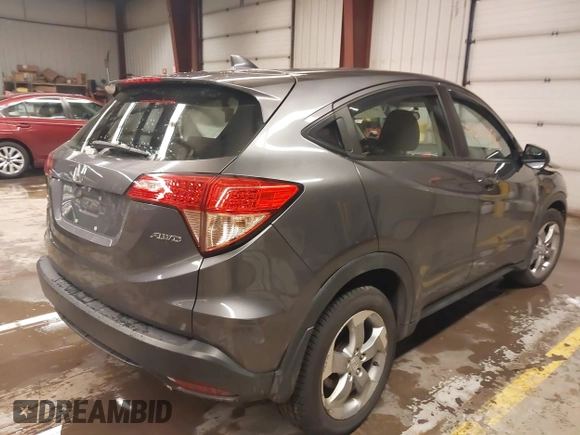 2018 Honda HR-V LX with VIN 3CZRU6H35JM704037, listed as a IAAI auction lot 41574796 with 140,671 mi miles. Bid and sale history available at carsss.com. Image 4.