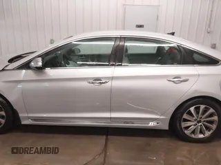 2015 Hyundai Sonata Sport with VIN 5NPE34AF3FH141616, listed as a IAAI auction lot 41005650 with 138,291 mi miles and . Bid and sale history available at DreamBid. Image 14.