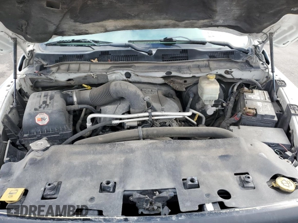 2013 Ram 2500 Tradesman z VIN 3C6TR5HT5DG560300, wystawiony jako Copart lot #44741345 z przebiegiem 213 016 mil mil oraz Szkoda całkowita • Salvage title. Historia ofert i sprzedaży dostępna na DreamBid. Obrazek 11.