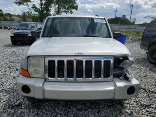 2009 Jeep Commander Sport with VIN 1J8HH48K89C540189, listed as a Copart auction lot 52552235 with 258,377 mi miles and Salvage title. Bid and sale history available at DreamBid. Image 5.