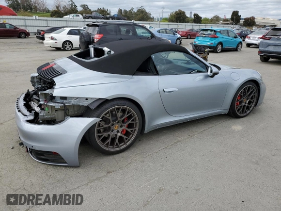 2020 Porsche 911 Carrera S z VIN WP0CB2A96LS263554, wystawiony jako Copart lot #52013384 z przebiegiem 8 702 mil mil oraz . Historia ofert i sprzedaży dostępna na DreamBid. Obrazek 3.