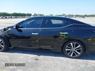 2021 Nissan Maxima SV with VIN 1N4AA6CV4MC506744, listed as a IAAI auction lot 42150465 with 70,056 mi miles and . Bid and sale history available at DreamBid. Image 14.