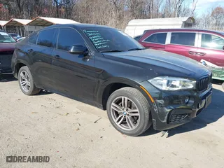 2019 BMW X6 xDrive35i with VIN 5UXKU2C50K0Z62820, listed as a IAAI auction lot 41006008 with 79,104 mi miles. Bid and sale history available at carsss.com. Image 1.