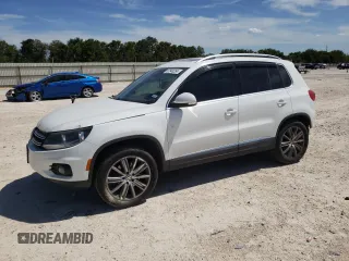 2015 Volkswagen Tiguan SEL with VIN WVGAV7AX6FW556406, listed as a Copart auction lot 67948354 with 92,257 mi miles and Salvage title. Bid and sale history available at DreamBid. Image 1.