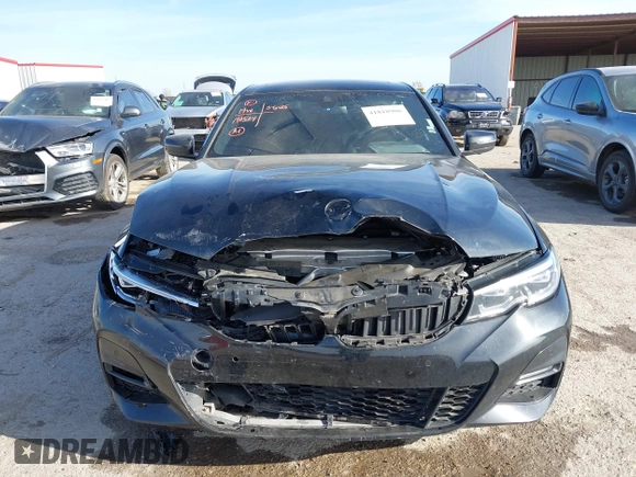 2021 BMW 3 Series 330i z VIN 3MW5R1J05M8B84800, wystawiony jako IAAI lot #41818906 z przebiegiem Nie podano mil oraz . Historia ofert i sprzedaży dostępna na DreamBid. Obrazek 12.