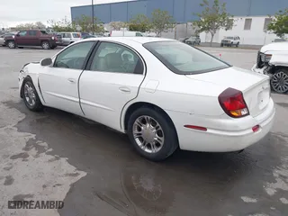 2001 Oldsmobile Aurora with VIN 1G3GS64C114109142, listed as a IAAI auction lot 41974652 with 81,395 mi miles. Bid and sale history available at carsss.com. Image 3.
