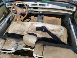 1976 Cadillac Eldorado z VIN 6L67S4Q405945, wystawiony jako Copart lot #73257834 z przebiegiem 98 761 mil mil oraz Nie do naprawy • Non repairable. Historia ofert i sprzedaży dostępna na DreamBid. Obrazek 8.