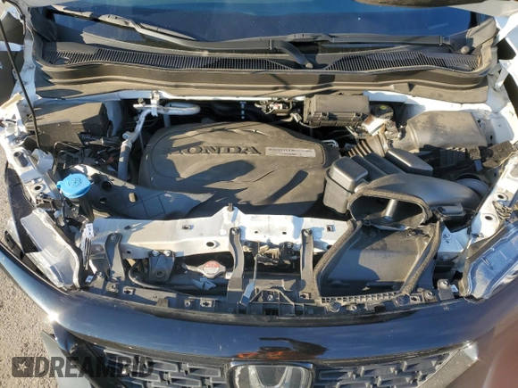 2019 Honda Passport EX-L z VIN 5FNYF8H57KB029404, wystawiony jako Copart lot #86810504 z przebiegiem Nie podano mil oraz Szkoda całkowita • Salvage title. Historia ofert i sprzedaży dostępna na DreamBid. Obrazek 12.
