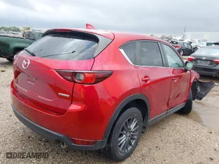 2021 Mazda CX-5 Touring with VIN JM3KFACM4M0382834, listed as a IAAI auction lot 41716817 with 28,894 mi miles. Bid and sale history available at carsss.com. Image 4.