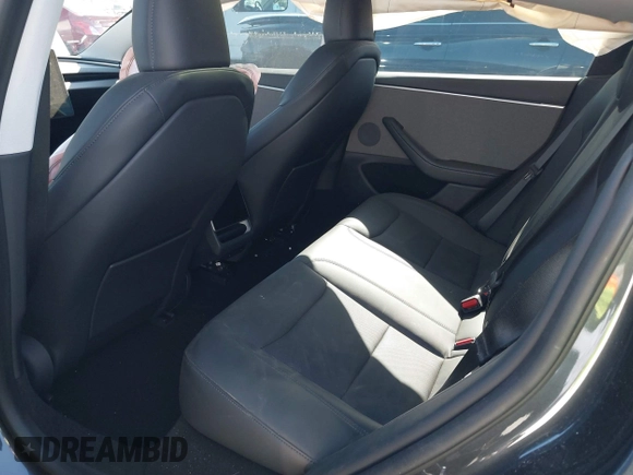 2024 Tesla Model 3 z VIN 5YJ3E1EA7RF736647, wystawiony jako IAAI lot #41372410 z przebiegiem 12 889 mil mil oraz . Historia ofert i sprzedaży dostępna na DreamBid. Obrazek 8.
