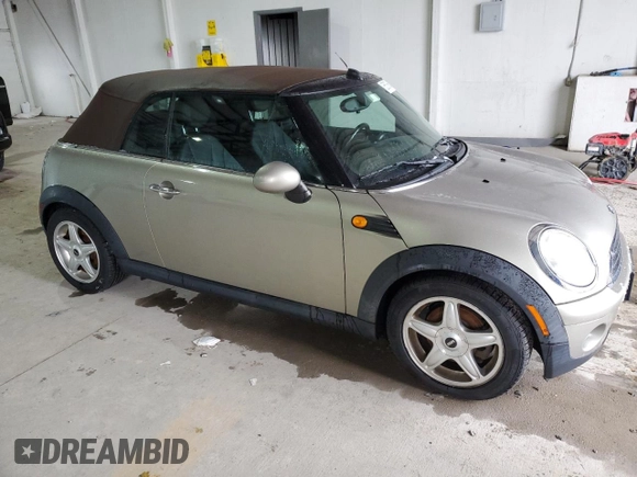 2010 MINI Convertible with VIN WMWMR3C56ATU98122, listed as a Copart auction lot 85808664 with 75,844 mi miles and Clean Title. Bid and sale history available at DreamBid. Image 4.