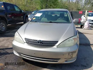 2006 Toyota Camry STD with VIN 4T1BE32K16U680241, listed as a IAAI auction lot 42002721 with 188,867 mi miles. Bid and sale history available at carsss.com. Image 12.