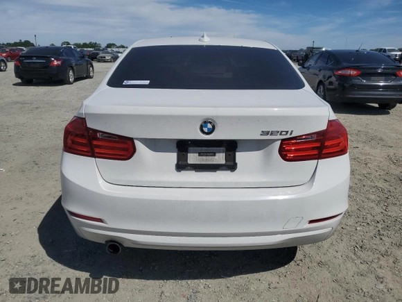 2015 BMW 3 Series 320i with VIN WBA3B1C52FK136581, listed as a Copart auction lot 52803405 with 138,495 mi miles and Salvage Title. Bid and sale history available at carsss.com. Image 6.