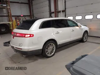 2013 Lincoln MKT EcoBoost with VIN 2LMHJ5AT3DBL56954, listed as a IAAI auction lot 41705877 with 148,771 mi miles. Bid and sale history available at carsss.com. Image 4.