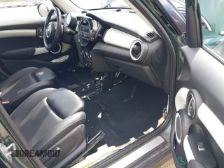 2016 MINI Hardtop 4 Door with VIN WMWXU1C57G2D09401, listed as a IAAI auction lot 42013695 with 43,437 mi miles and . Bid and sale history available at DreamBid. Image 5.