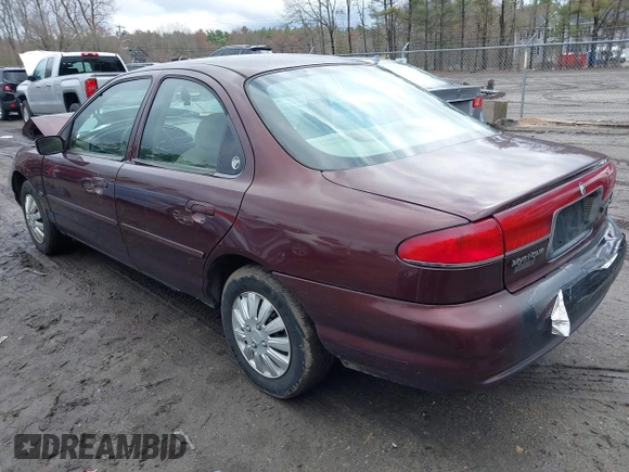 2000 Mercury Mystique GS z VIN 1MEFM6533YK613961, wystawiony jako IAAI lot #41982995 z przebiegiem 83 174 mil mil oraz . Historia ofert i sprzedaży dostępna na DreamBid. Obrazek 3.