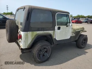 1993 Jeep Wrangler z VIN 1J4FY29SXPP206084, wystawiony jako Copart lot #59419925 z przebiegiem 154 021 mil mil oraz Czysty tytuł • Clean title. Historia ofert i sprzedaży dostępna na DreamBid. Obrazek 3.