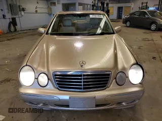 2002 Mercedes-Benz E-Class with VIN WDBJF65J12B485293, listed as a Copart auction lot 77561984 with 140,708 mi miles and Salvage Title. Bid and sale history available at carsss.com. Image 5.
