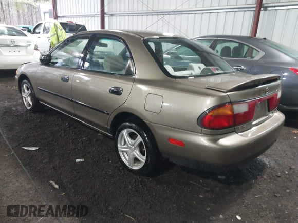 1998 Mazda Protege DX with VIN JM1BC141XW0200689, listed as a IAAI auction lot 41540162 with 172,311 mi miles and . Bid and sale history available at DreamBid. Image 3.