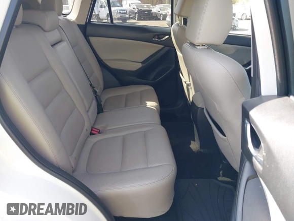 2013 Mazda CX-5 Grand Touring with VIN JM3KE4DE3D0156957, listed as a IAAI auction lot 42085443 with 146,990 mi miles. Bid and sale history available at carsss.com. Image 8.