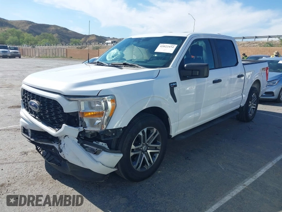 2021 Ford F-150 XL with VIN 1FTEW1CP2MKE42968, listed as a IAAI auction lot 42022454 with 32,908 mi miles. Bid and sale history available at carsss.com. Image 2.