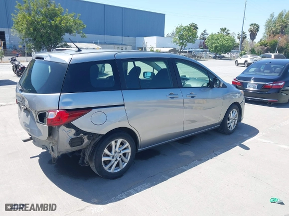 2012 Mazda Mazda5 Sport with VIN JM1CW2BL4C0103408, listed as a IAAI auction lot 42087883 with 219,601 mi miles. Bid and sale history available at carsss.com. Image 4.