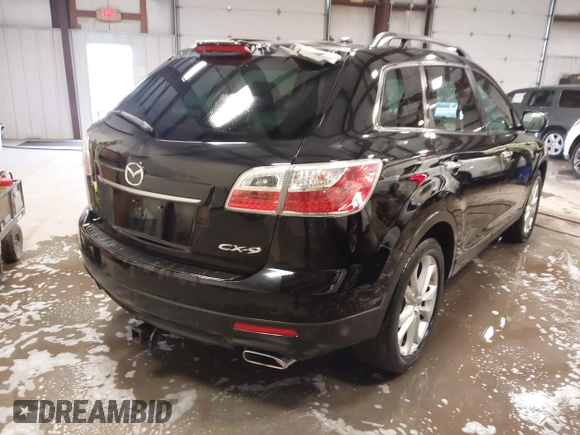 2012 Mazda CX-9 Grand Touring with VIN JM3TB2DA0C0337897, listed as a IAAI auction lot 41324433 with 173,077 mi miles. Bid and sale history available at carsss.com. Image 4.