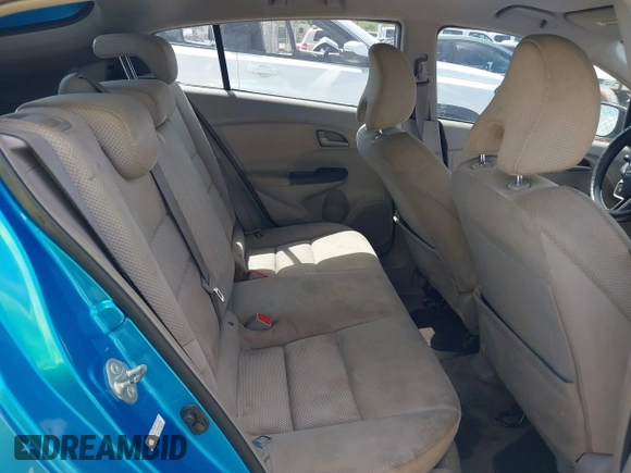 2010 Honda Insight EX with VIN JHMZE2H71AS003290, listed as a IAAI auction lot 42601332 with 163,510 mi miles and . Bid and sale history available at DreamBid. Image 8.
