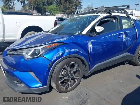 2019 Toyota C-HR XLE with VIN JTNKHMBX5K1043079, listed as a IAAI auction lot 41813367 with 77,879 mi miles and . Bid and sale history available at DreamBid. Image 18.
