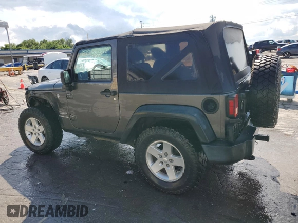 2017 Jeep Wrangler Willys Wheeler with VIN 1C4AJWAG2HL527192, listed as a Copart auction lot 58169245 with 88,737 mi miles and Salvage title. Bid and sale history available at DreamBid. Image 2.