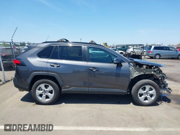 2019 Toyota RAV4 Hybrid LE with VIN 2T3MWRFV7KW006027, listed as a IAAI auction lot 42397600 with 67,205 mi miles and . Bid and sale history available at DreamBid. Image 14.