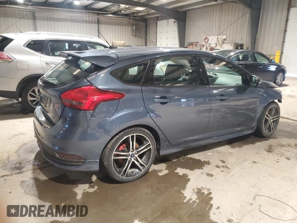 2018 Ford Focus ST with VIN 1FADP3L97JL276559, listed as a Copart auction lot 45962445 with 69,070 mi miles and Salvage Title. Bid and sale history available at DreamBid. Image 3.