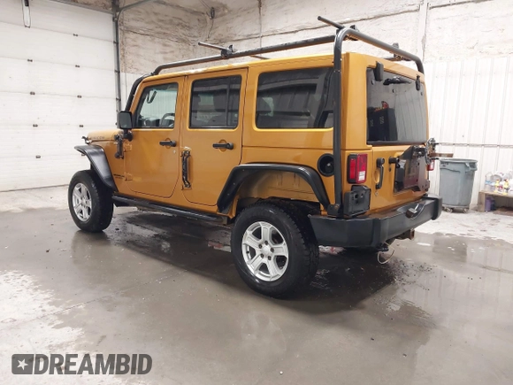 2014 Jeep Wrangler Unlimited Rubicon with VIN 1C4BJWFG7EL254534, listed as a IAAI auction lot 41279731 with 140,218 mi miles. Bid and sale history available at carsss.com. Image 3.