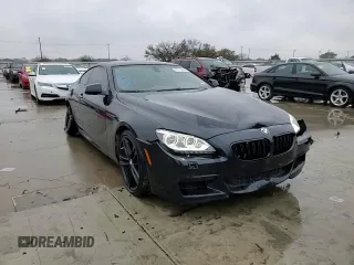 2013 BMW 6 Series 650i with VIN WBAYM9C58DDW20061, listed as a Copart auction lot 83113314 with 75,500 mi miles and Salvage Title. Bid and sale history available at carsss.com. Image 10.