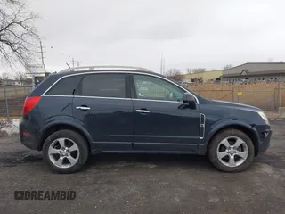 2014 Chevrolet Captiva Sport LT z VIN 3GNAL3EK5ES663143, wystawiony jako IAAI lot #41669555 z przebiegiem 99 880 mil mil oraz . Historia ofert i sprzedaży dostępna na DreamBid. Obrazek 13.
