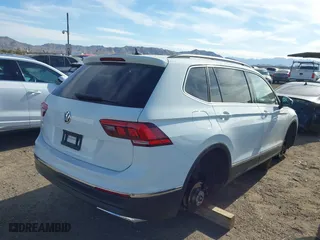2020 Volkswagen Tiguan SE with VIN 3VV3B7AX0LM039721, listed as a IAAI auction lot 41627081 with 56,405 mi miles. Bid and sale history available at carsss.com. Image 4.