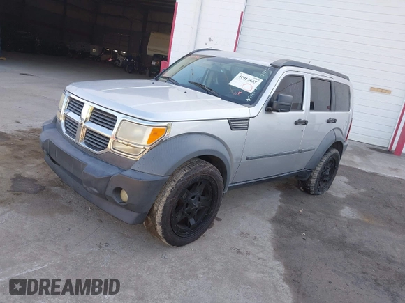 2007 Dodge Nitro SXT with VIN 1D8GT28K27W619313, listed as a IAAI auction lot 41917685 with 195,841 mi miles. Bid and sale history available at carsss.com. Image 2.