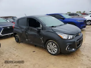2017 Chevrolet Spark LT with VIN KL8CD6SAXHC817327, listed as a Copart auction lot 50614525 with 82,439 mi miles and Salvage Title. Bid and sale history available at DreamBid. Image 4.