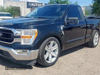 2021 Ford F-150 XL with VIN 1FTMF1C51MKD73149, listed as a Copart auction lot 65839105 with 95,957 mi miles and Clean title. Bid and sale history available at DreamBid. Image 2.